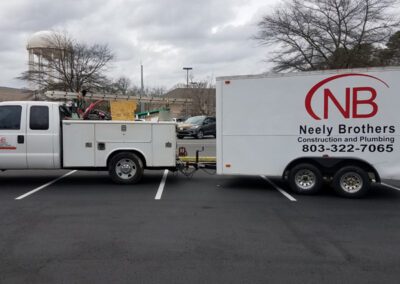 Neely Brothers Construction and Plumbing | Truck in parking lot