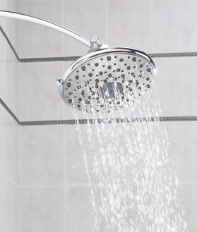 Neely Brothers Construction and Plumbing | showerhead running in bathroom